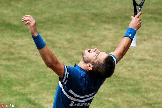 哈雷赛决赛费德勒1-2丘里奇