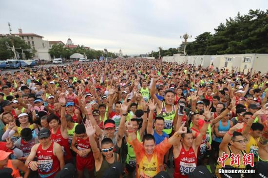 资料图：中国马拉松正处于成长阶段 中新社记者 盛佳鹏 摄