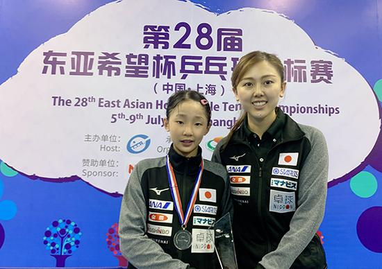 张本美和和教练孙雪。