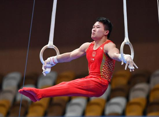 广西队选手兰星宇在男子吊环决赛中。最终他以14.733分夺得冠军。新华社记者张博文摄