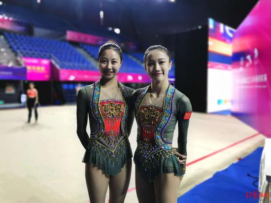 ▲来自成都体育学院的国家队选手胡雨卉（左）和黄张嘉洋（右）期待明年的大运会