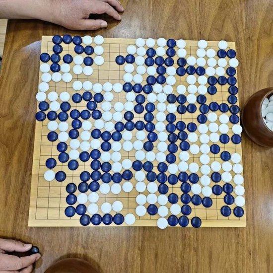 谭春仁（捏黑）4d  vs  王修勋（捏白）4d