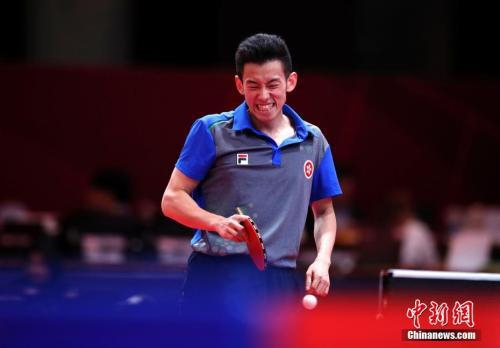 资料图：黄镇廷在比赛中。中新社记者 刘关关 摄