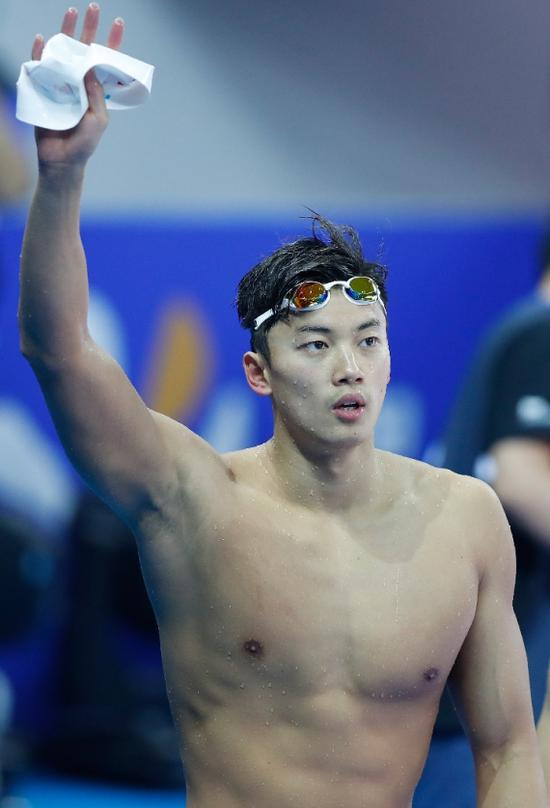 中国选手汪顺在2018国际泳联短池游泳世界锦标赛男子100米个人混合泳决赛后。新华社记者王丽莉摄