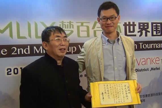 聂卫平向围棋大赛梦百合杯赞助商倪张根发放“英雄帖”