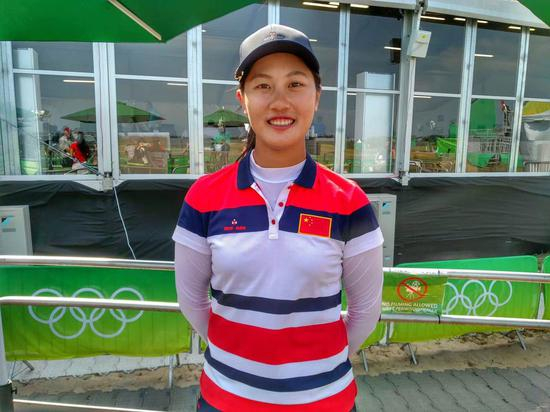 赛后第一时间采访奥运一杆进洞的林希妤(图/李昕)