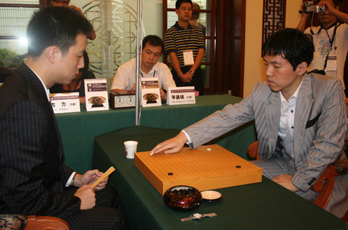 （春兰杯八强战，古力战石佛）