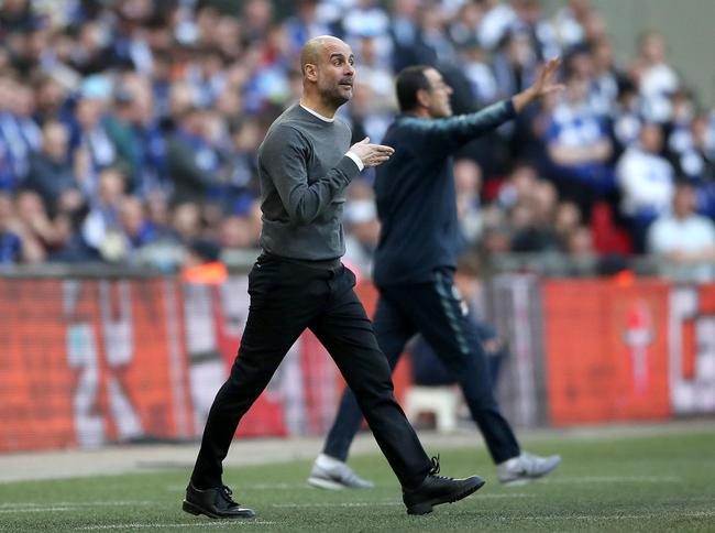 瓜迪奥拉和萨里场边指挥