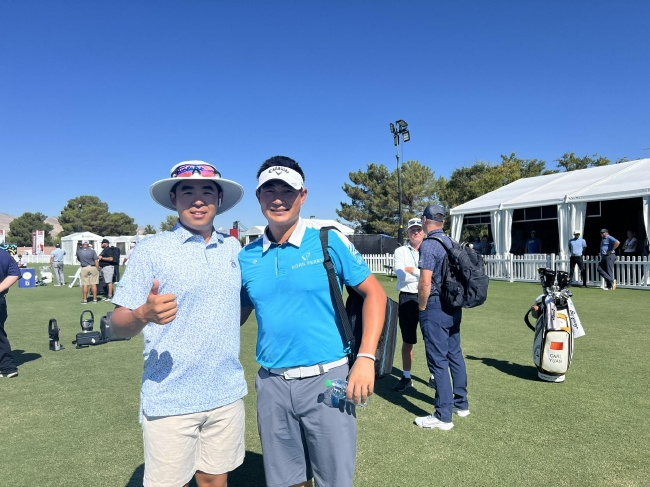 罗学文（左）与袁也淳