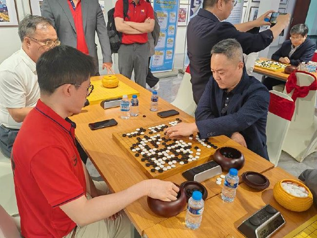 （老挝比赛采用中国围棋数子规则）