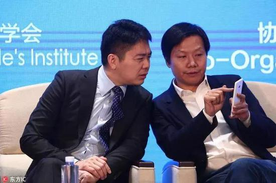  （刘强东与雷军的著名合影。侵删。）