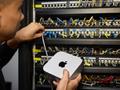 一台12.7厘米见方的Mac mini，把一家年接待4.5亿人次的火锅巨头悄悄改写