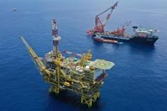 中国海油触及涨停，成交额59.43亿元