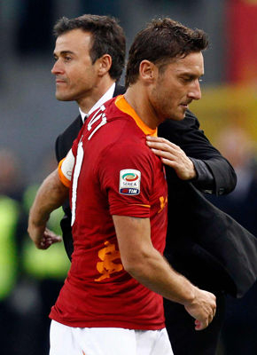 恩里克在罗马失意，但在巴萨成为三冠教头