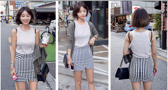 撞色条纹个性拼接高腰半身裙搭配纯色打底背心或针织开衫，演绎街拍风的潮流魅力