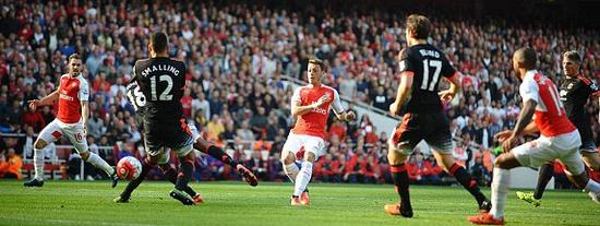 厄齐尔扩大比分