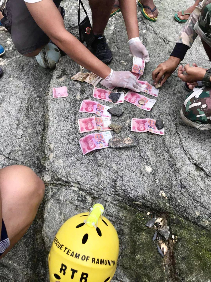 最后发现的遗体身上的人民币，沉船遇难者的身份由此基本确认。（图片来自公羊队）