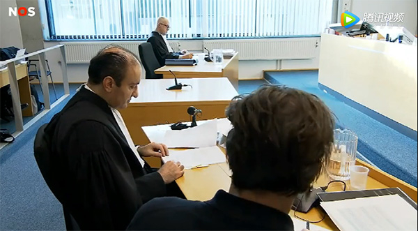 荷兰听证会现场 荷兰电视台截图