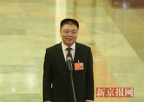 住建部部长王蒙徽接受采访。新京报记者 侯少卿 摄