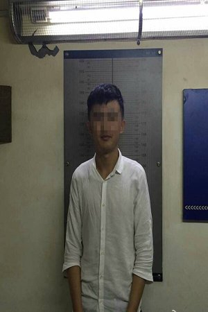 警方公布的胡某被捕后照片。图由杭州警方发布