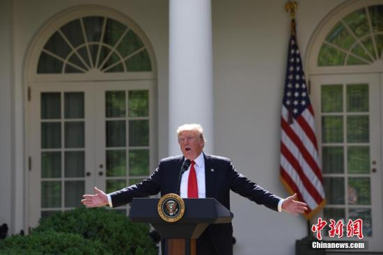 　　当地时间6月1日，美国总统特朗普在白宫宣布，美国将退出《巴黎协定》。他同时强调，美国也许会重返有关应对气候变化的协定，但前提条件是协定必须要对美国更加“公平”。 中新社记者 刁海洋 摄