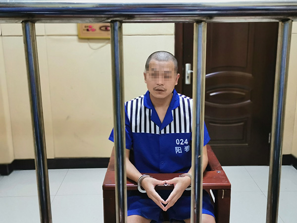 化身“刘明远”的祁某在看守所 本文图均为 武汉警方 供图
