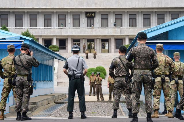 韩朝今起撤出板门店地区全部武器将向平民游客开放_手机新浪网