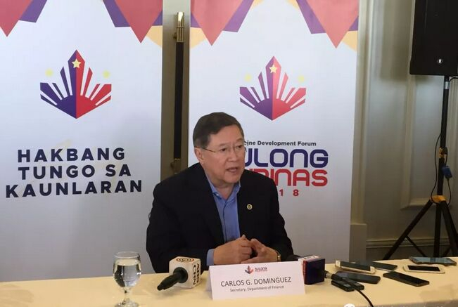 多明计斯 图《菲律宾世界日报》