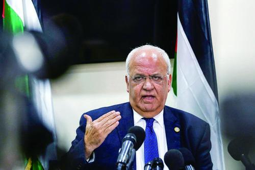 　　▲19日，约旦河西岸城市拉马拉，巴勒斯坦解放组织秘书长兼首席谈判代表埃雷卡特在新闻发布会上称，所有以色列定居点都是非法的。&nbsp;|视觉中国