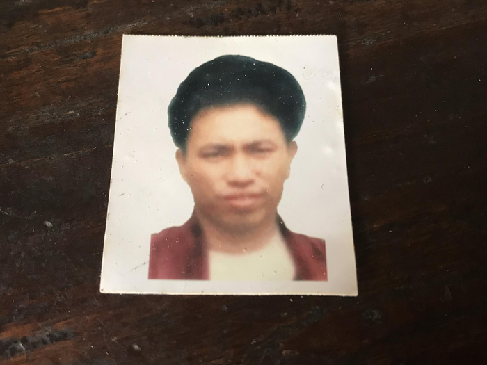  刘家仅留下刘运洪一张模糊的一寸照。澎湃新闻记者 宋蒋萱 图