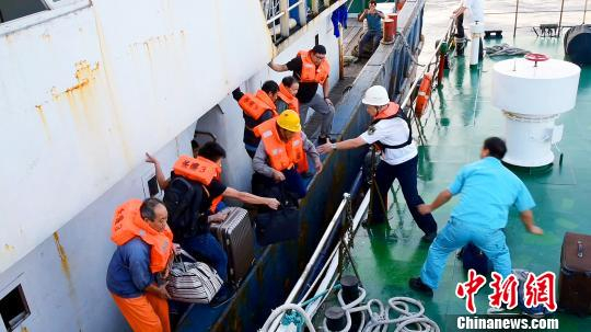 图为救援现场。　李文 摄