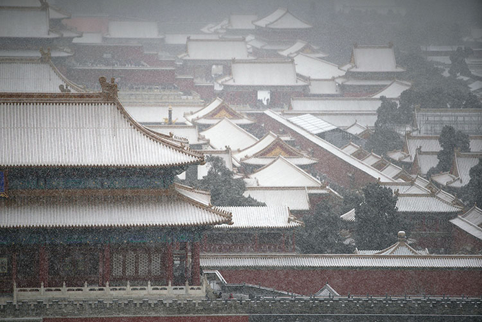 大雪中的故宫别有一番姿色。