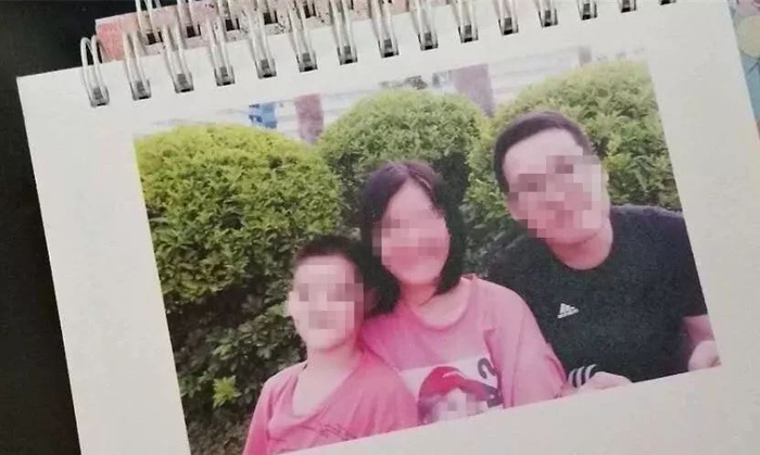 曾经的三口之家合影&nbsp; &nbsp; 图据自闭症公益组织微信公号“大米和小米”