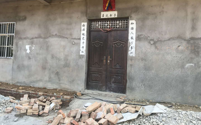 冯才勇家大门紧闭。新京报记者 王昱倩 摄