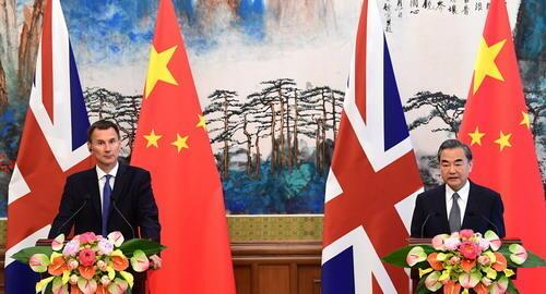 国务委员兼外交部长王毅与亨特