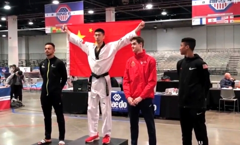 赵帅夺得男子68公斤以下级冠军 视频截图：央视新闻