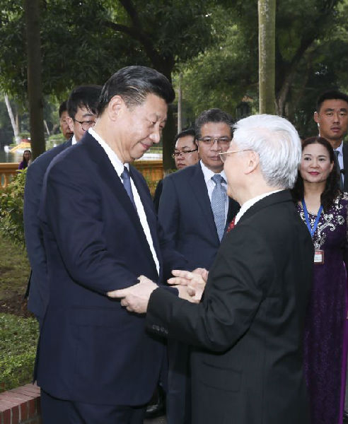 2017年11月13日，中共中央总书记、国家主席习近平在河内会见越共中央总书记阮富仲。（新华社）