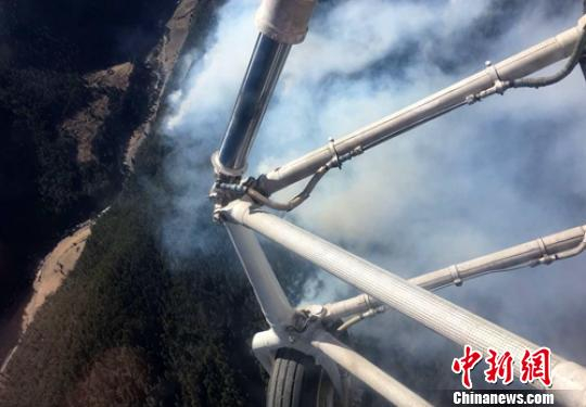 雅江恶古乡“2.16”森火现场已无明火，但烟点较多。南航空护林总站提供