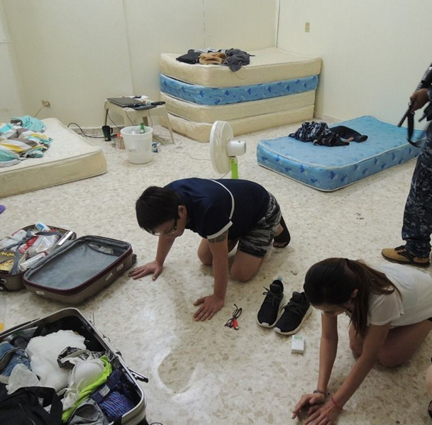 台湾诈骗集团成员被逮捕。（图片来源：台湾《联合报》）