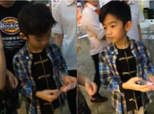 张柏芝帅儿捧甜甜圈不吃