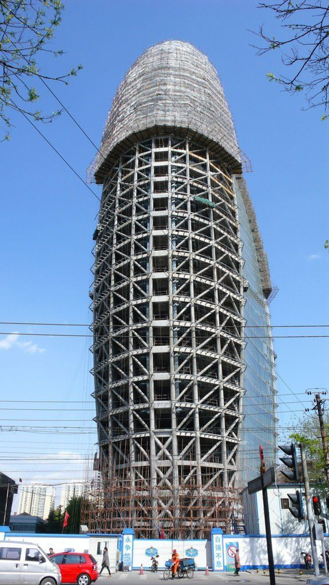 人民日报新大楼外部装修被指像“土豪金”