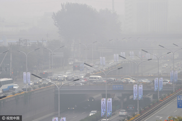 雾霾季京津空气重污染 城市如笼黑纱