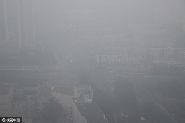 雾霾季京津空气重污染 城市如笼黑纱