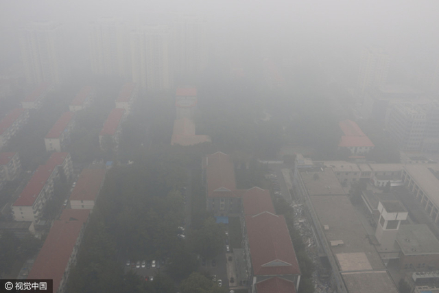 雾霾季京津空气重污染 城市如笼黑纱