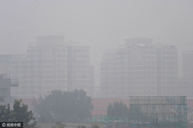 雾霾季京津空气重污染 城市如笼黑纱
