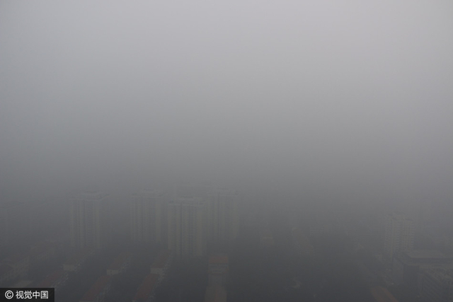 雾霾季京津空气重污染 城市如笼黑纱