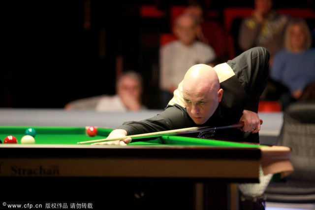 马克-金俯身击球