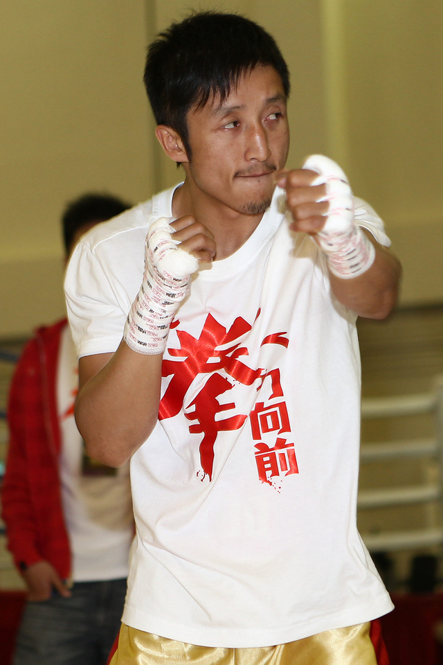 邹市明强力出拳