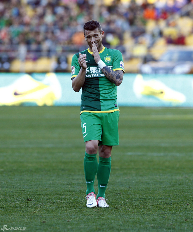 马季奇笑容满面