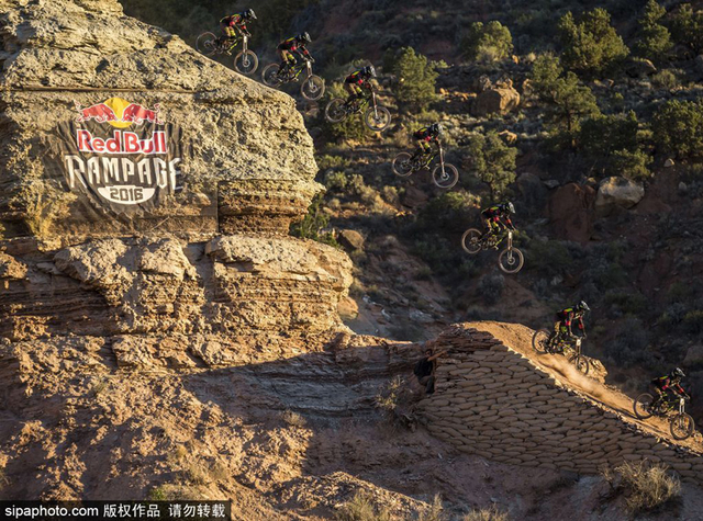 红牛坠山赛开幕 达人挑战“高空舞步”